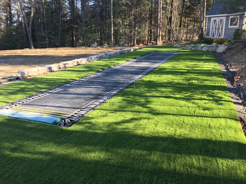 Synthetic grass around trampoline Bedford NH