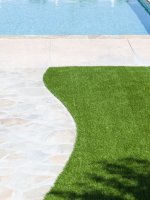 synthetic turf next to a pool